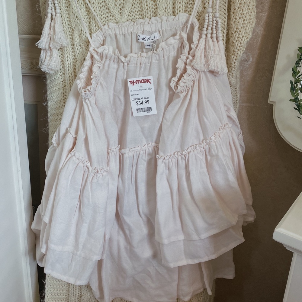 Off-the-shoulder baby pink flowy top